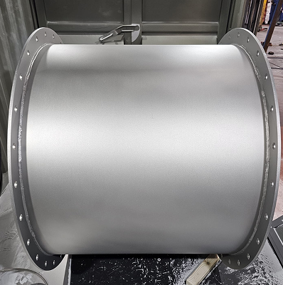 A polished piece of metal work with a neat matte finish